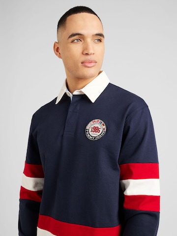 Tricou 'ARCHIVE GAMES' de la Tommy Jeans pe albastru