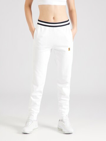 NIKE Tapered Sports trousers in White: front