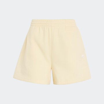 ADIDAS ORIGINALS Loose fit Pants 'Essential' in Yellow