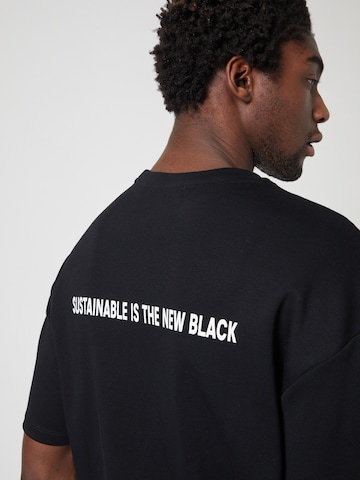 T-Shirt ABOUT YOU x Louis Darcis en noir