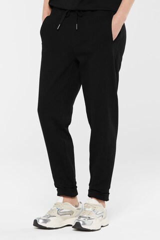 SENSES.THE LABEL Loose fit Pants in Black: front