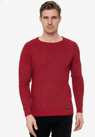 Rusty Neal Figurbetonter Feinstrick Pullover in Rot: predná strana