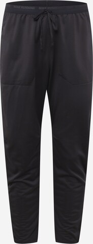 NIKE Tapered Sportsbukser i sort: forside