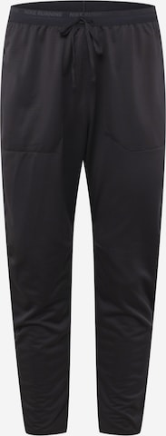 NIKE Zúžený Sportovní kalhoty – černá: přední strana