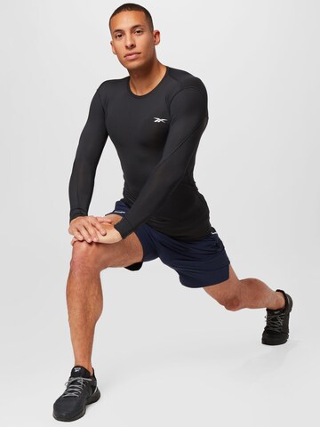 ReebokTehnička sportska majica - crna boja