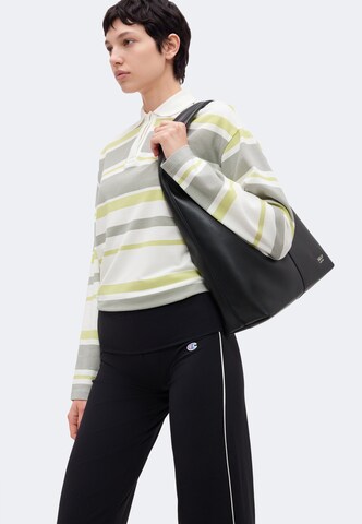 Champion - Acampanado Pantalón en negro: lado