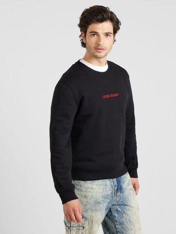 Sweat-shirt GUESS JEANS en noir : devant