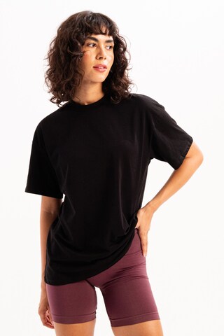T-shirt Justever en noir : devant