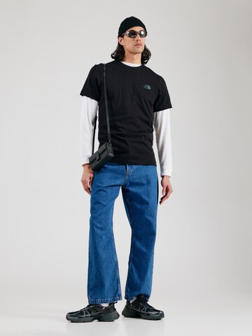 THE NORTH FACE - Camiseta 'Tailgrid Infill' en negro