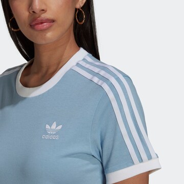 ADIDAS ORIGINALS T-shirt i blå