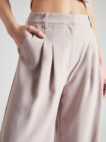 ABOUT YOU x Iconic by Tatiana Kucharova Loose fit Pleat-Front Pants 'Mathilda' in Beige