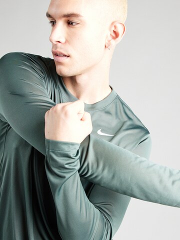 NIKE - Camiseta funcional en verde