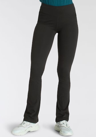 FAYN SPORTS Flared Workout Pants in Black: front