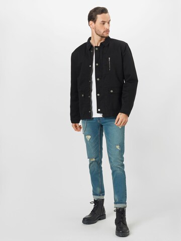 Coupe regular Veste mi-saison Urban Classics en noir