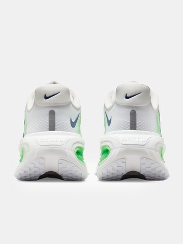 NIKE Running Shoes in White