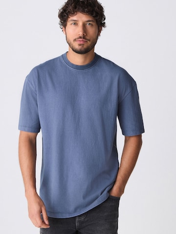 Next Shirt in Blue: front