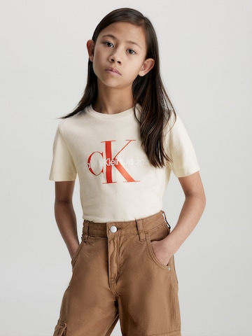 Calvin Klein Jeans Tričko - Béžová: predná strana
