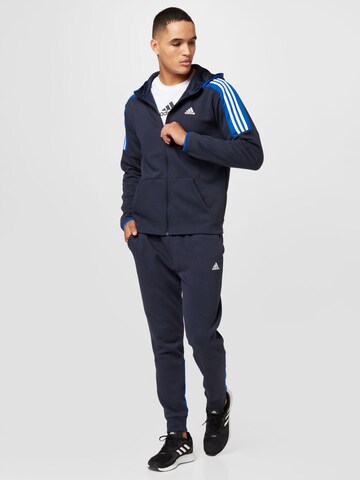 mėlyna ADIDAS SPORTSWEAR Treniruočių kostiumas 'Fleece Colorblock': priekis