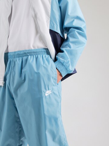 Nike Sportswear Joggingpak 'CLUB' in Blauw