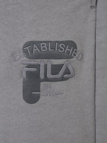 pelēks FILA Pakapēniski sašaurināts piegriezums Bikses