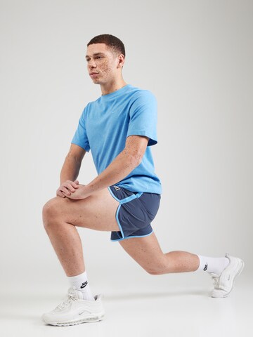 NIKE Performance shirt 'Primary' in Blue