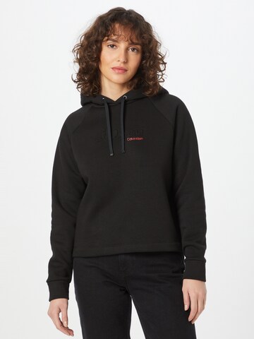 Sweat-shirt Calvin Klein en noir : devant