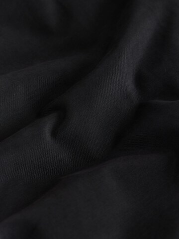 Next - Parca de invierno en negro