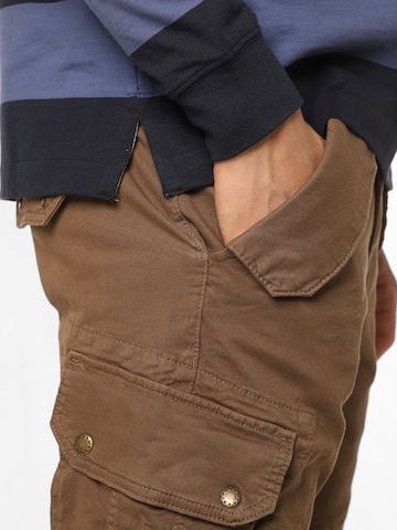 ALPHA INDUSTRIES Ozke Kargo hlače 'Combat' | rjava barva