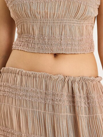 Completo pantalone di Bianco Lucci in rosa