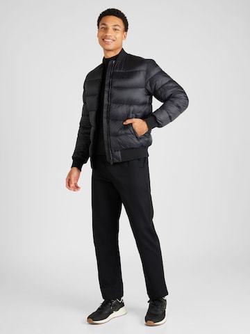 Champion Authentic Athletic Apparel Prehodna jakna | črna barva