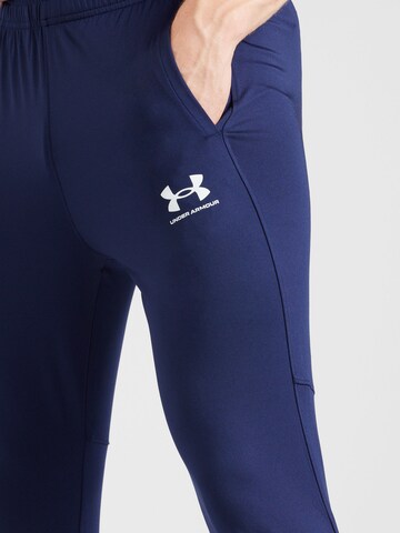 UNDER ARMOUR Zwężany krój Spodnie sportowe 'Challenger' w kolorze niebieski