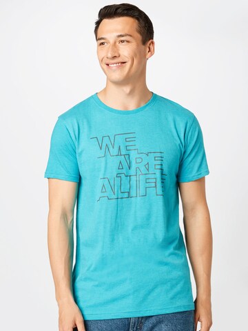 Alife and Kickin Shirt in Blue: front