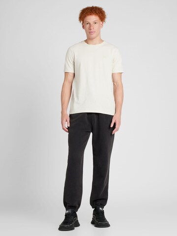 Abercrombie & Fitch Tapered Housut 'ESSENTIAL' värissä musta