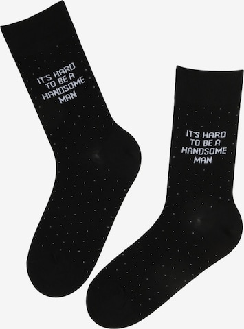 Calzino 'TAAVI cotton socks for a handsome man' di Sokisahtel in nero: frontale