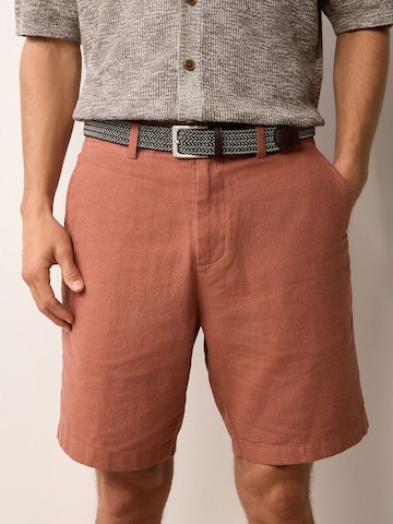 Next Regular Chino in Oranje: voorkant