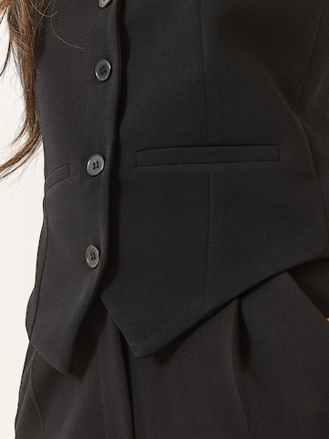 Pantalons de tailleur Bianco Lucci en noir