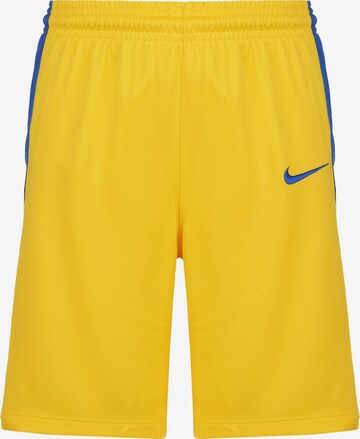 Loosefit Pantalon de sport NIKE en jaune : devant