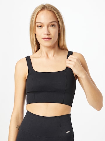 aim'n Bralette Sports Bra in Black: front