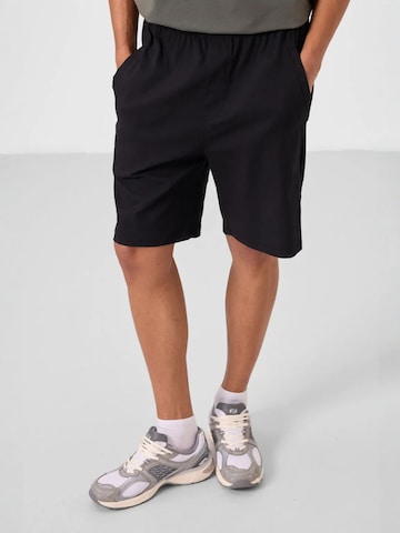 Tommy Life Wide Leg Shorts in Schwarz: Vorderseite