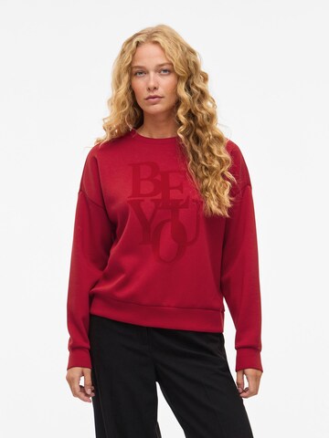 Sweat-shirt 'VIReflect' VILA en rouge : devant