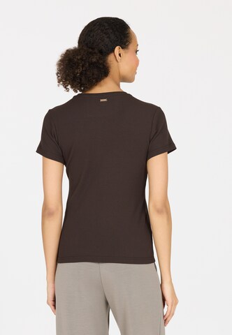 Athlecia Functioneel shirt 'Lankae' in Bruin