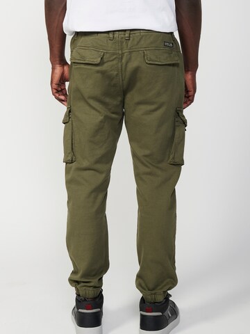 KOROSHI Tapered Cargobroek in Groen
