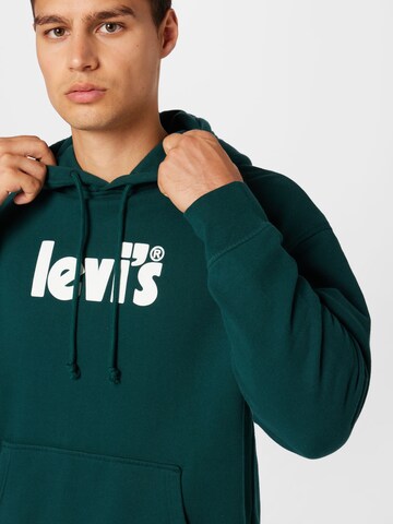 LEVI'S ® - Regular Fit Sweatshirt 'Relaxed Graphic Hoodie' em verde