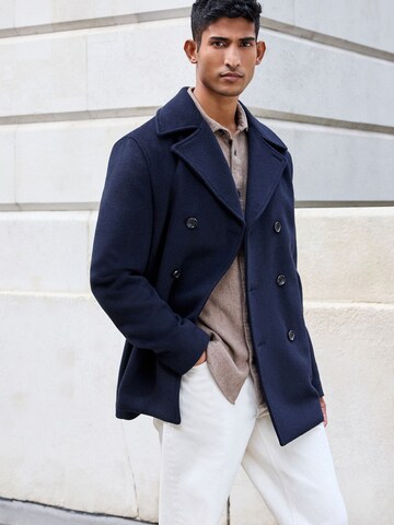 Next Övergångskappa i blå