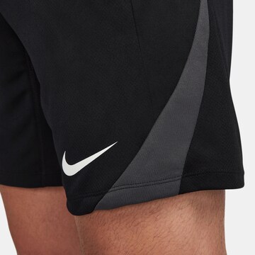 NIKE Regular Workout Pants 'Strike' in Black