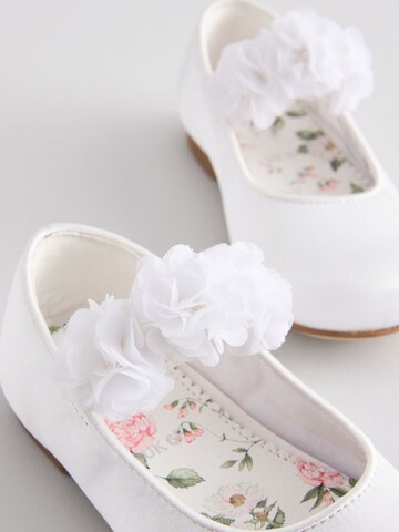 Next - Bailarina en blanco