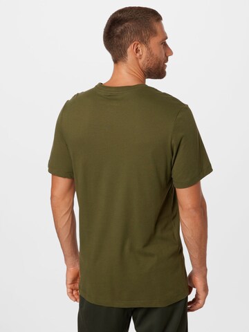 NIKE - Ajuste regular Camiseta funcional en verde