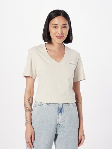 T-shirt Calvin Klein Jeans en beige : devant