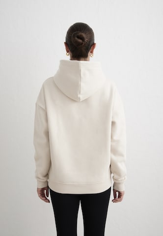 Sweat de sport Aim'n en beige