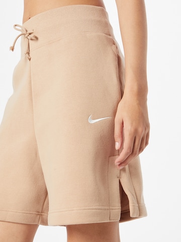 Nike Sportswear Voľný strih Nohavice 'Phoenix fleece' - Béžová